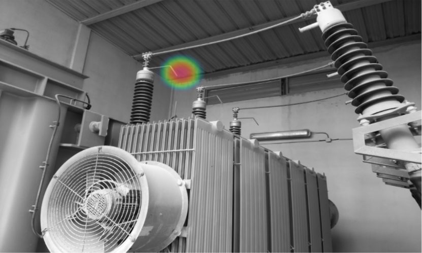 Caméra acoustique — décharge partielle localisée sur un transformateur HTA, signature ultrasonore colorée